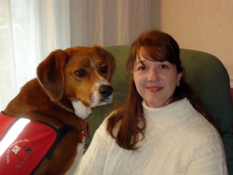 Chloe doesn't like it when it rains either, for it means "no walk"!