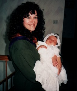 Wendi with daughter Paige at her baptism in 1994 after she lost her hearing.