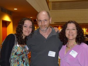 Wendi, husband Dave, and daughter Paige at a Hearing Loss Association Convention